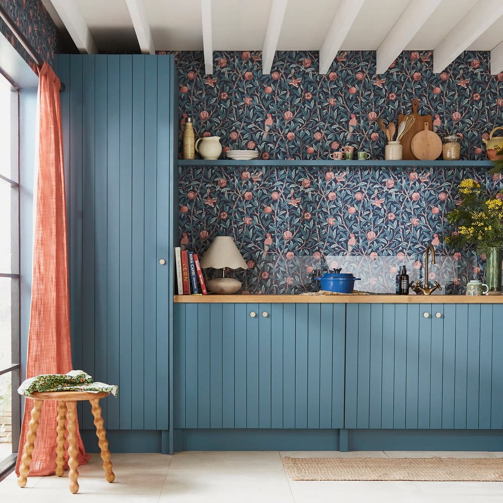 William Morris At Home Bird & Pomegranate Navy Blue Wallpaper in a kitchen